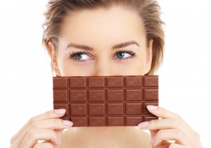 Woman holding a chocolate bar
