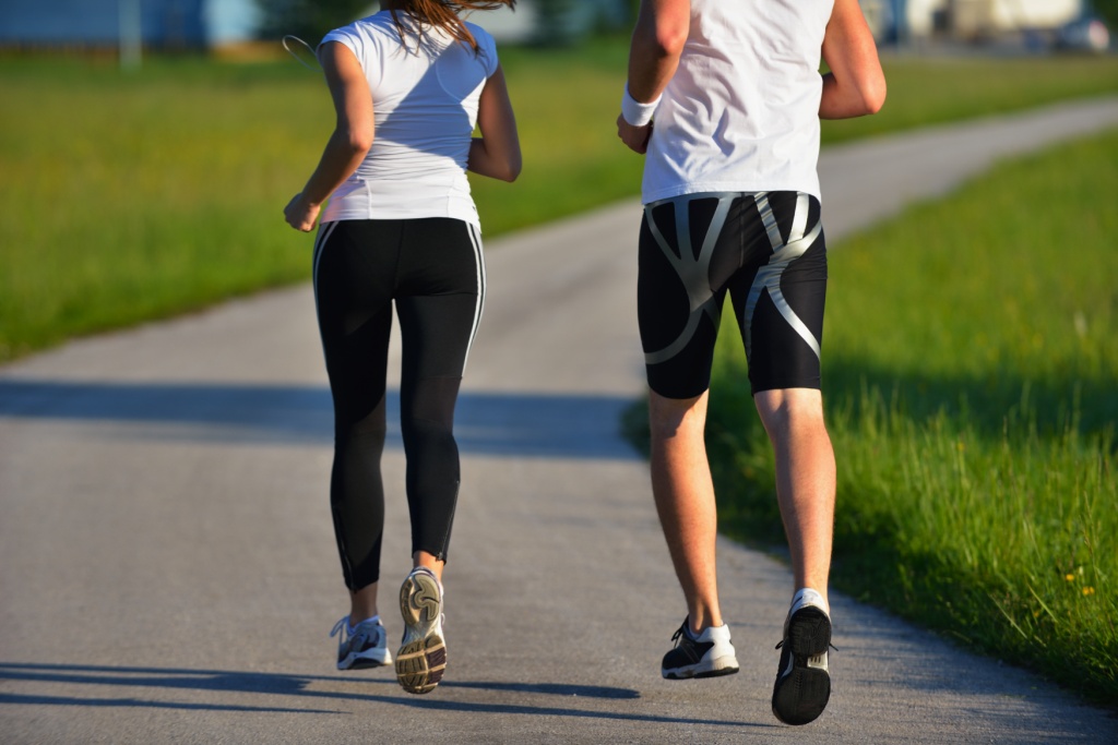 Young couple jogging in park